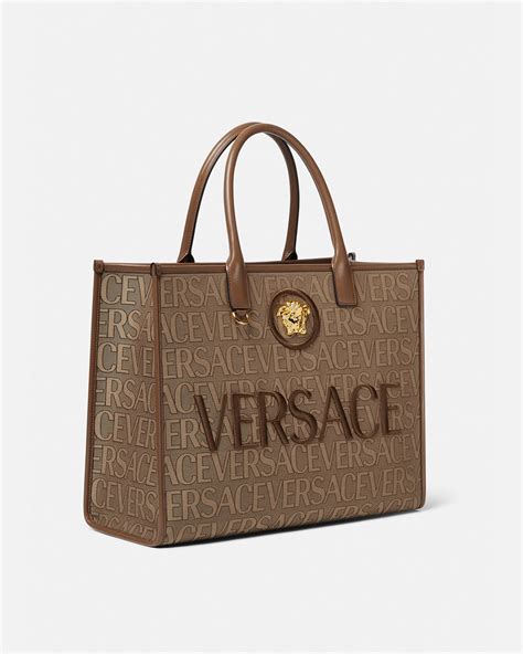 versace big bags|Versace handbags with big zipper.